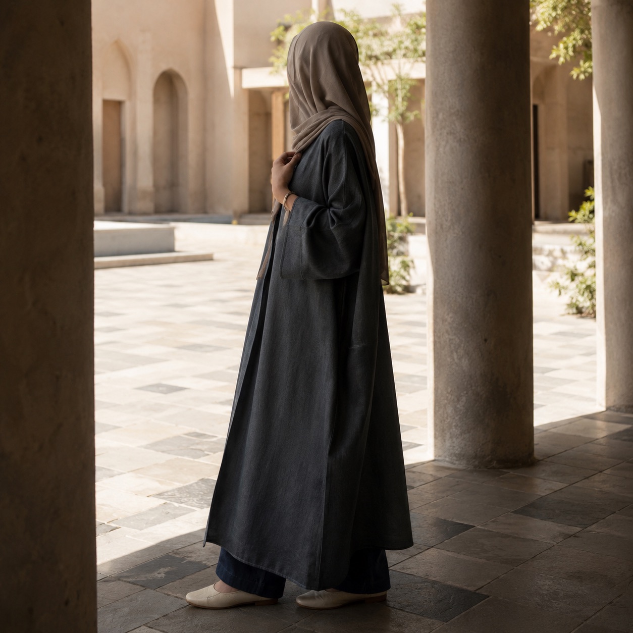 Nettlebed closed abaya — Abayas & Robes by RUQYAH. worn by a model.