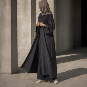 Granta closed abaya — Abayas & Robes by RUQYAH. worn by a model.