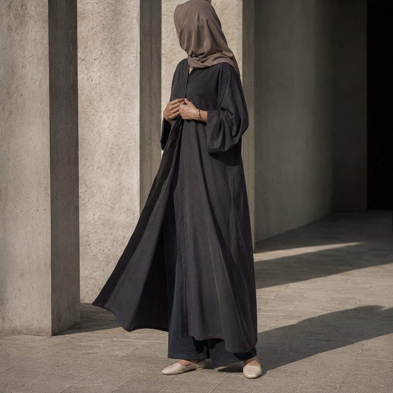 Granta closed abaya — Abayas & Robes by RUQYAH. worn by a model.