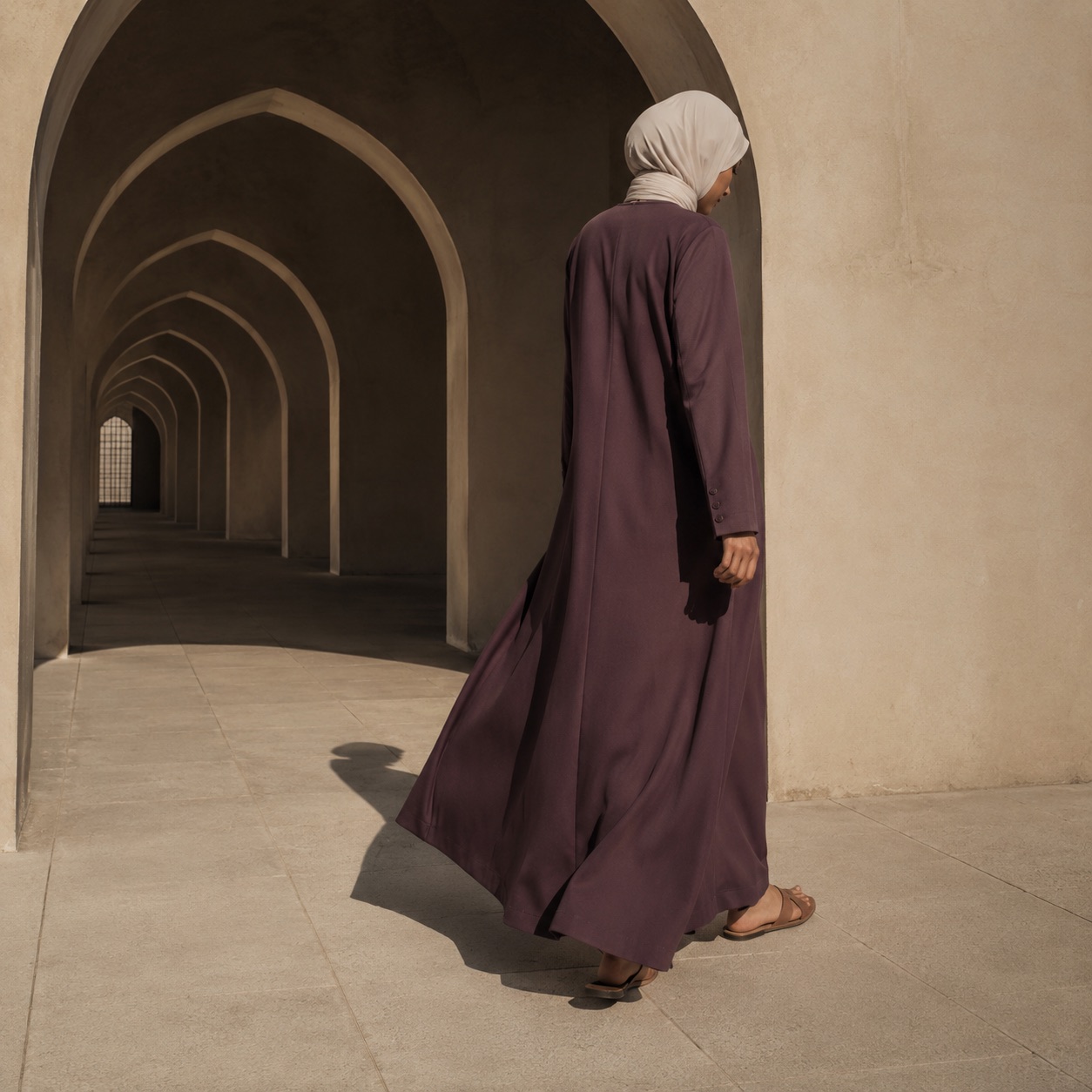 Nettlebed closed abaya — Abayas & Robes by RUQYAH. worn by a model.