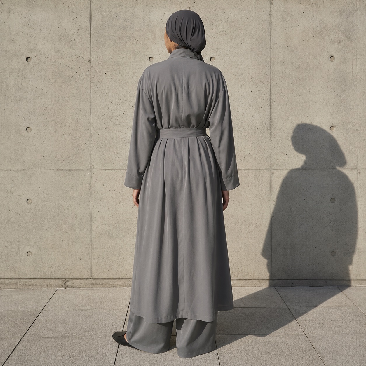 Selborne belted robe — Abayas & Robes by RUQYAH. worn by a model.