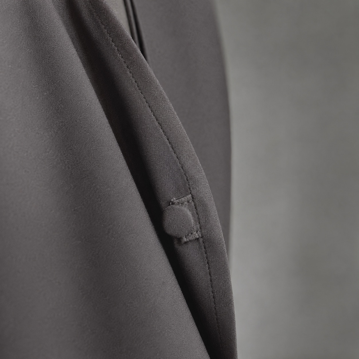 Purbeck open-front abaya — Abayas & Robes by RUQYAH. close detail of the fabric and finish.