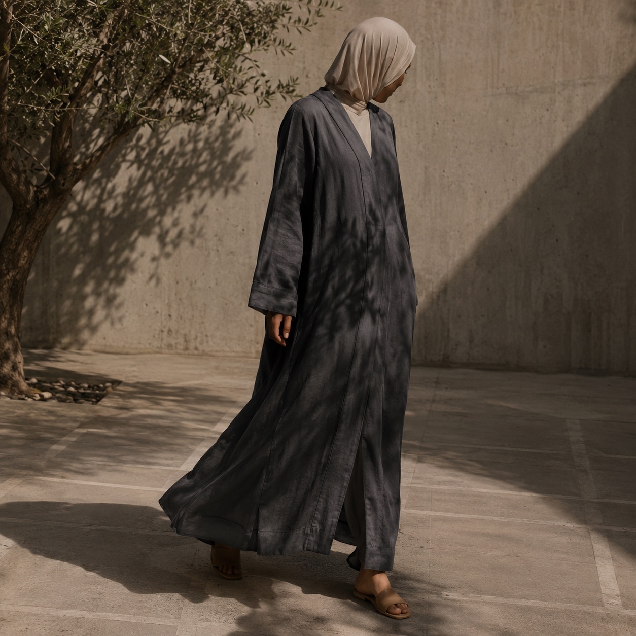Purbeck open-front abaya — Abayas & Robes by RUQYAH. worn by a model.