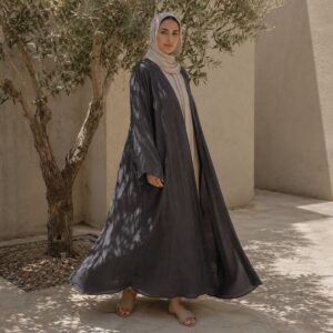 Purbeck open-front abaya — Abayas & Robes by RUQYAH. worn by a model.