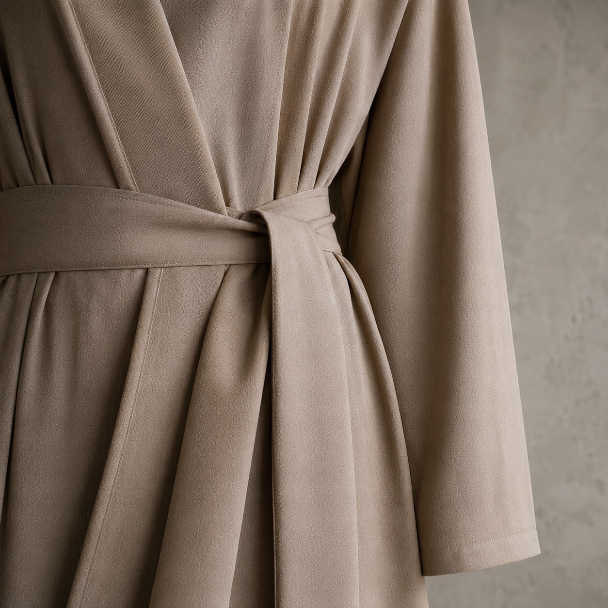 Ilkley belted robe — Abayas & Robes by RUQYAH. close detail of the fabric and finish.