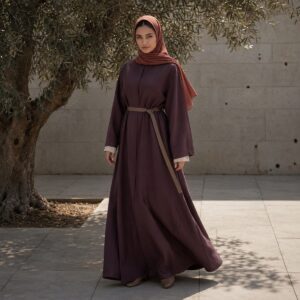 Rowanhill closed abaya — Abayas & Robes by RUQYAH. worn by a model.