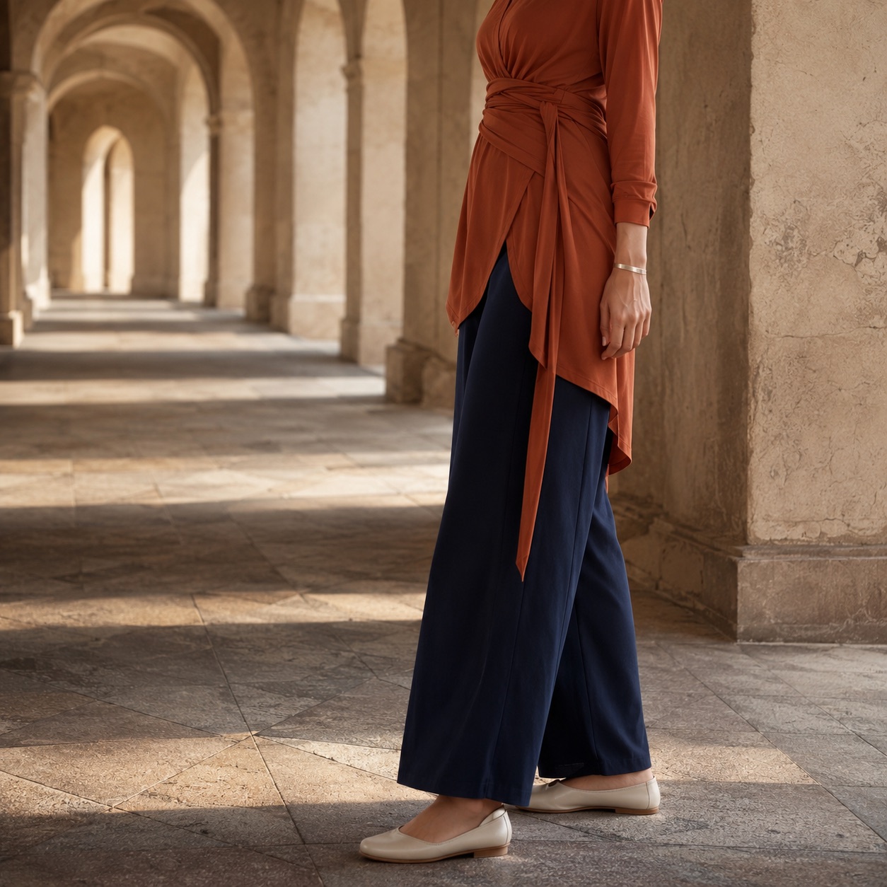 Lindisfarne jersey wrap headscarf — Shawls & Headscarves by RUQYAH. worn by a model, side view.