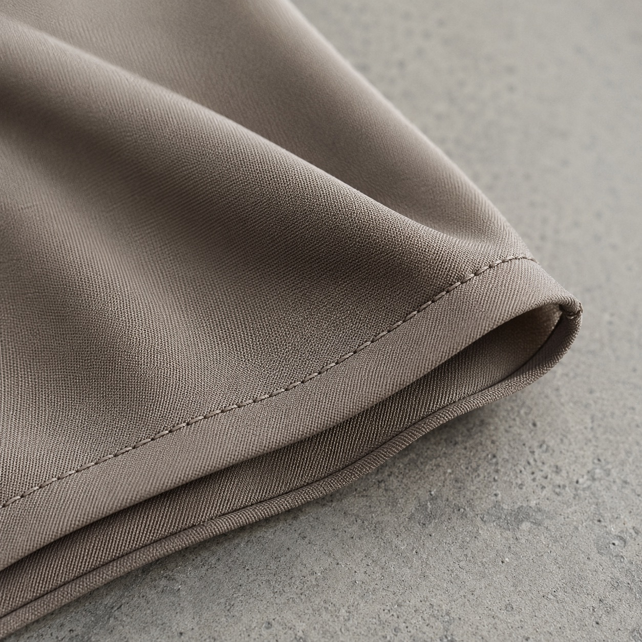Brackenmoor square headscarf — Shawls & Headscarves by RUQYAH. close detail of the fabric and finish.