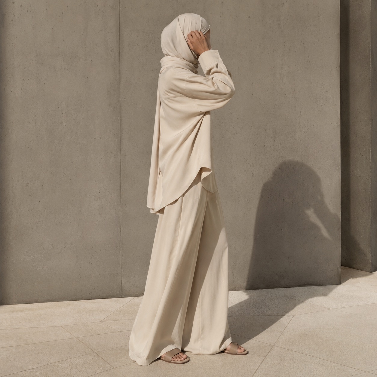 Rowanhill palazzo co-ord — Trouser Sets by RUQYAH. worn by a model, side view.
